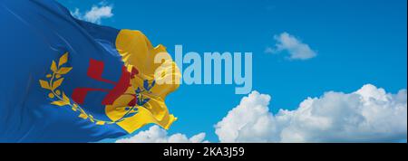 flag of Berbers Kabyle people at cloudy sky background, panoramic view. flag representing ethnic group or culture, regional authorities. copy space fo Stock Photo