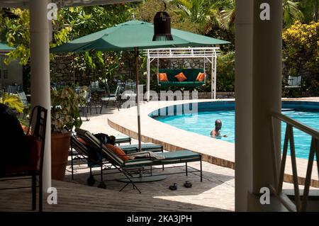 Hotel swimming pool and restaurant area, Port-au-Prince, Haiti.  This hotel was originally an old colonial building and was converted into a luxury ho Stock Photo