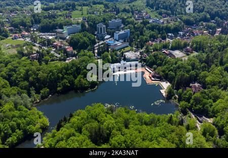 Aerial landscape with Ursu Lake in Sovata resort - Romania. It is the largest heliothermal lake in the world with the highest saline concentration Stock Photo