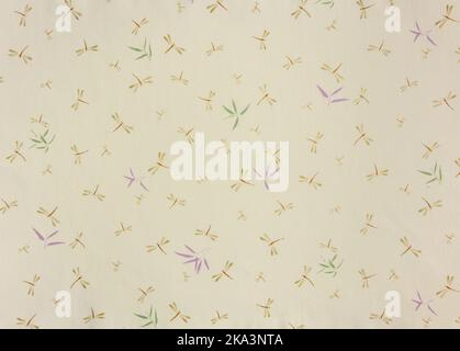 Close up on a high detailed photograph of a Japanese furoshiki cloth with a pattern design illustrated by odonata dragonflies and damselflies insects Stock Photo