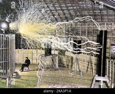 NIKOLA TESLA (1856-1943) Serbian-American  in electrical engineer with his 'magnifying transmitter' in a double exposure photo about 1900. Photo: BIPS