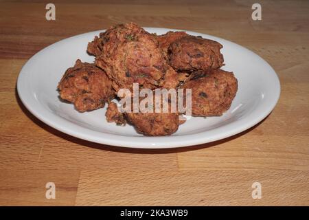 Pakoda or Pakora. typical fritters of Indian cuisine Stock Photo