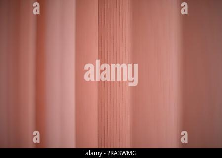 Texture pink blinds. Blinds on window. Protection from light. Repeating bands. Stock Photo
