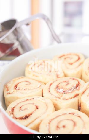 Close-up of a tray of homemade cinnamon rolls ready to bake Stock Photo