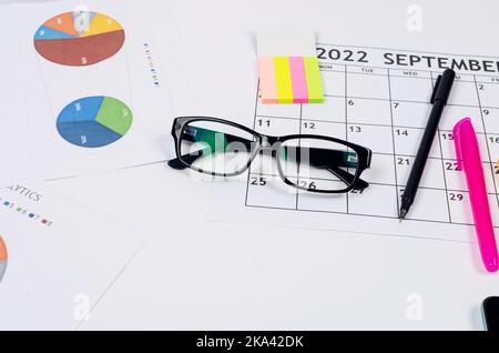 Business background. Financial analysis, accounting, statistics, investment, sales analysis. Working set for analyzing statistics. Charts and graph wi Stock Photo
