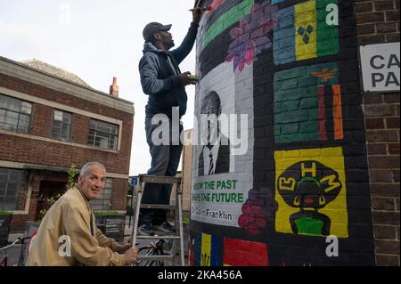 Unveiling of Black History Month mural outside Elsdale Street surgery, Hackney, honouring Dr Colin Franklin  one of the first Black doctors in Hackney Stock Photo