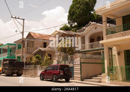 Street scene, Jacmel, Haiti.  Jacmel is a large town on the south coast of Haiti, and was one of the richest towns in the Caribbean.  Modern buildings Stock Photo