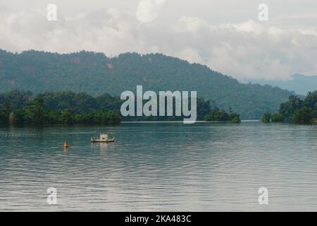 A photo in the vast Tasik Kenyir Lake in Terengganu, Malaysia which also happens to be the biggest manmade lake in the southeast Asia. Stock Photo