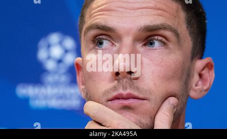 Munich, Germany. 31st Oct, 2022. Soccer: Champions League, Bayern Munich - Inter Milan, Group stage, Group C, Matchday 6. Inter Milan press conference at the Allianz Arena. Robin Gosens of Milan sits on the podium. Credit: Sven Hoppe/dpa/Alamy Live News Stock Photo