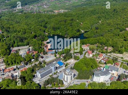 Aerial landscape with Ursu Lake in Sovata resort - Romania. It is the largest heliothermal lake in the world with the highest saline concentration Stock Photo