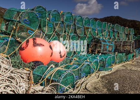 Lobster pots at Gairloch harbour on the Atlantic coast of Scotland Stock Photo