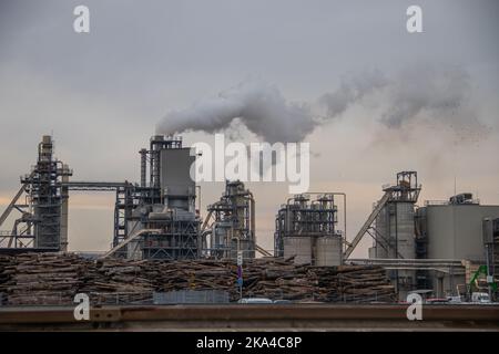 City pollution mixed with morning fog, industrial chimneys around Belgrade, one of the most polluted cityscapes in Europe Stock Photo