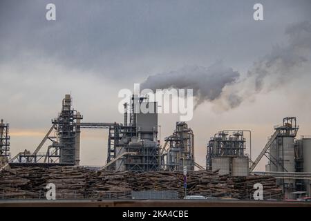 City pollution mixed with morning fog, industrial chimneys around Belgrade, one of the most polluted cityscapes in Europe Stock Photo