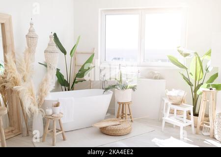 Interior Shot Of Light Stylish Bathroom In Boho Style With Rustic Decorations Stock Photo