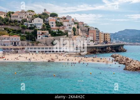 09-03-2022  Marseille France. Gorgeous gentle day on the French Riviera - calm light waves and the sun sparkling in the water - people on the beach . Stock Photo