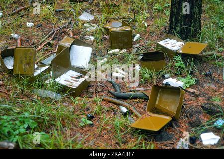 Non Exclusive: KHARKIV REGION, UKRAINE - OCTOBER 26, 2022 - The boxes with the fuses for a BM-21 Grad multiple rocket launcher is pictured in a forest Stock Photo