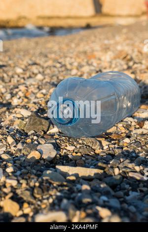 Plastic bottle on a beach Stock Photo