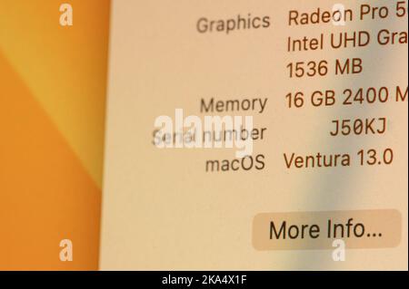New york, USA - October 31, 2022: Specs of apple laptop with Ventura macOs close up view on laptop pixel screen Stock Photo