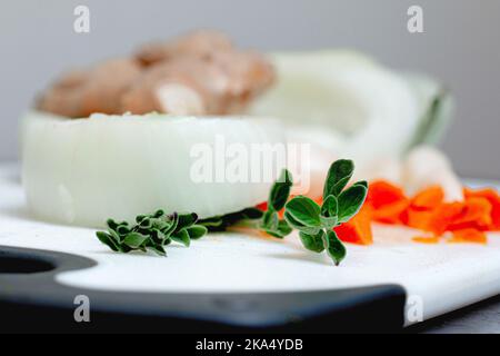 Textured Thyme on White Cutting Board Stock Photo