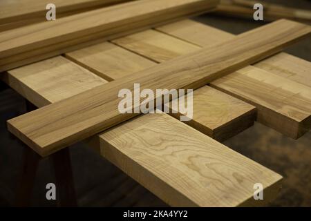 Boards for construction. Joinery. Lots of boards. Wood products. Stock Photo