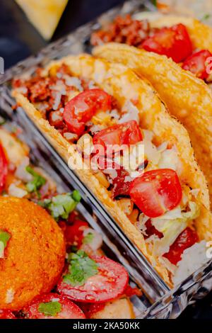 Close Up Fiesta Tacos with Tomato Stock Photo