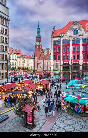 Wroclaw, Poland - December 2019: Traditional decorated square, polish Christmas Market in medieval Salt Market Square. Stock Photo