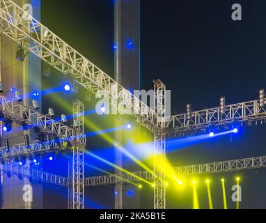 multiple spotlights on a theatre stage lighting rig Stock Photo