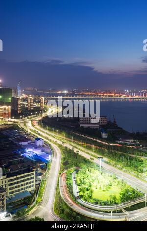 shanghai interchange overpass and elevated road in nightfall Stock Photo