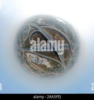 Aerial city view with crossroads, roads, houses, building Stock Photo