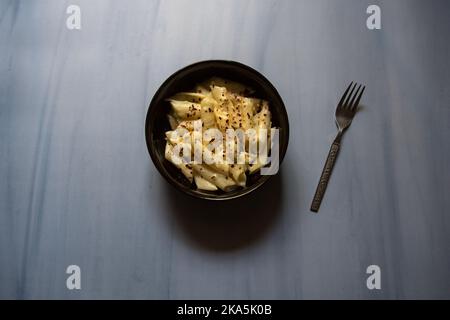 Ready to eat popular food item pasta in white sauce. Stock Photo