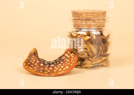 dried psychedelic mushroom fly agaric, microdosing for brain biohacking and expansion of consciousness stimulant. Stock Photo