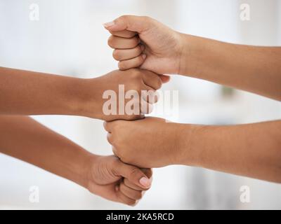 Fist bump, hands and team building for a mission, collaboration and business partnership goals with our vision. Teamwork, support and employees with Stock Photo