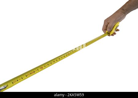 a male hand with a rollable tape measure on a transparent background Stock Photo