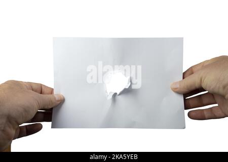 a white sheet of paper with a hole in the center on a transparent background Stock Photo