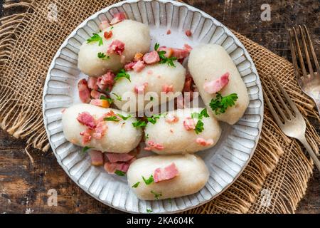 Pyzy - potato dumplings stuffed with meat, traditional Eastern European dish Stock Photo