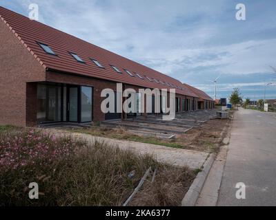 Sint Gillis Waas, Belgium, October 23, 2022, new houses are being built in a social residential area Stock Photo