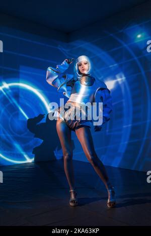 Cyber fashion woman on abstract techno background. AI concept. VR. Stock Photo