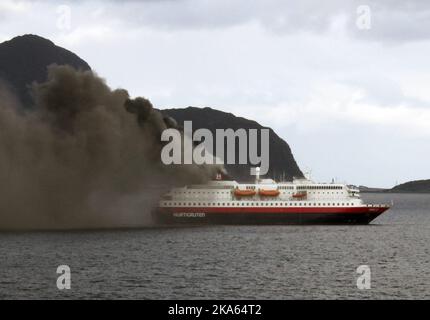 The cruise ship MS Nordlys shown just outside Alesund, Norway. Two people have been reported as dead and another 16 injured after an explosion reportedly occurred in the engine room. Stock Photo