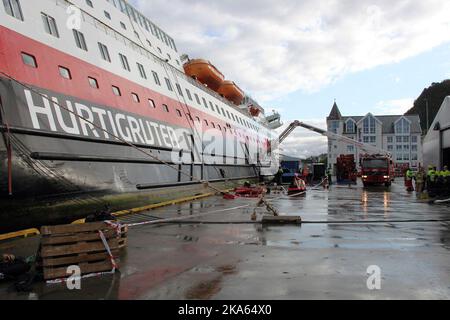 The cruise ship MS Nordlys, shown at the dock in Alesund, Norway. Two people have been reported as dead and another 16 injured after an explosion reportedly occurred in the engine room. Stock Photo