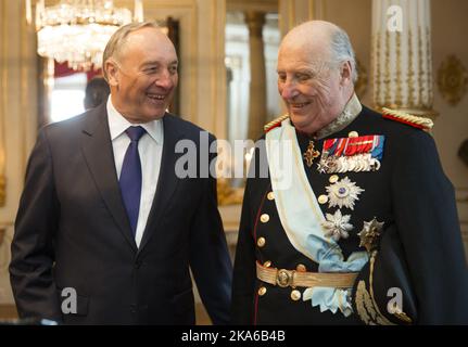 Oslo, Norway 20150318. Their Majesties The King and Queen extended an official welcome to His Excellency President Andris Berzino of Latvia to Norway in a ceremony on the Palace Square. HM King Harald and President Berzins are looking at gifts. Photo: Vidar Ruud / NTB scanpix Stock Photo