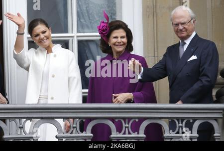 COPENHAGEN, DENMARK 20150416. Amalienborg Palace in Copenhagen celebrates Queen Margrethe's 75th birthday on Thursday. Royal guests and audience present. Crown Princess Victoria, Queen Silvia and King Carl Gustaf of Sweden on the balcony. Photo: Lise Aaserud / NTB scanpix Stock Photo