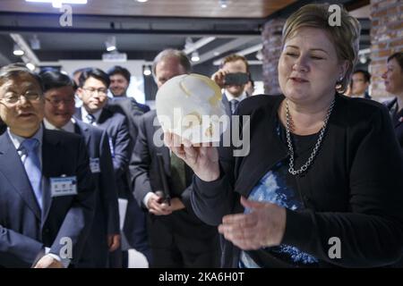 Ulsan SOUTH KOREA 20160416. Norwegian Prime Minister Erna Solberg holds a skull printed on a 3D printer during a visit to a South Korean innovation center in Ulsan. South Korea spends over 4% of GDP on research and development. Photo: Heiko Junge / NTB scanpix Stock Photo