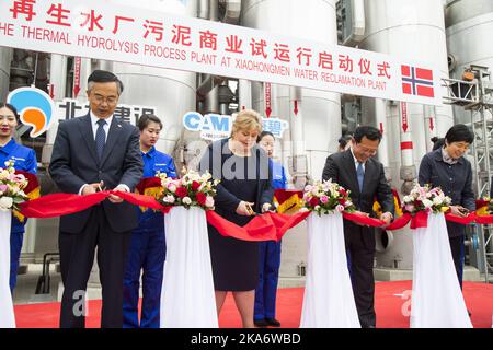 BEIJING, CHINA 20170407. Prime Minister Erna Solberg during the opening of the new Norwegian-owned sewage treatment plant Cambi in Beijing. The biogas plant adopts advanced Norwegian technology and cleans sewage from about 20 million inhabitants. Solberg is on an official visit to China where the resumption of political and economic cooperation with China is the main purpose of the visit. Photo: Heiko Junge / NTB scanpix Stock Photo