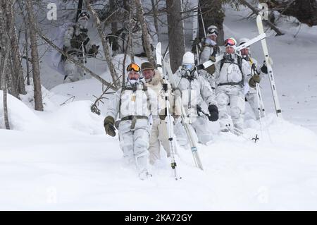 Vemork, Rjukan 20180228. Crown Prince Regent Haakon (in front) attends the 75th anniversary of the heavy water sabotage operation at Vemork, Wednesday. He follows the route of the saboteurs Photo: Haakon Mosvold Larsen / NTB scanpix Stock Photo