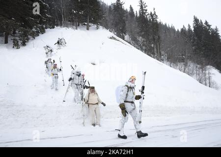 Vemork, Rjukan 20180228. Crown Prince Regent Haakon (in front) attends the 75th anniversary of the heavy water sabotage operation at Vemork, Wednesday. He follows the route of the saboteurs Photo: Haakon Mosvold Larsen / NTB scanpi Stock Photo