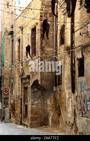 Old stone housing in the Centro Storico, Naples, Italy. Stock Photo