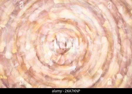 Abstract background made of motion blurred autumnal leaves. Stock Photo