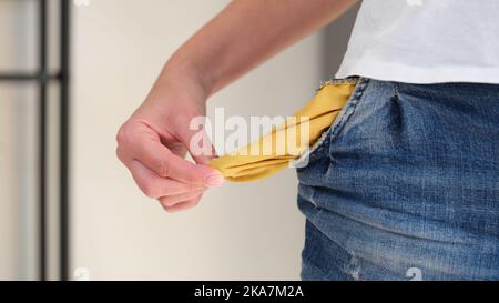 Man turning inside and showing empty pocket Stock Photo
