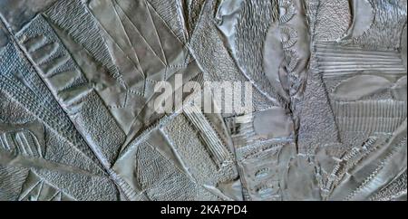 Artistically designed silver metal surface with rough pattern Stock Photo