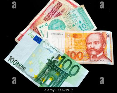 Croat Croatia banknotes of 100 Yugoslav Dinar Dinars Croatian Dinars Kuna Kune Kunas and EU Euro Euros on Black background Stock Photo